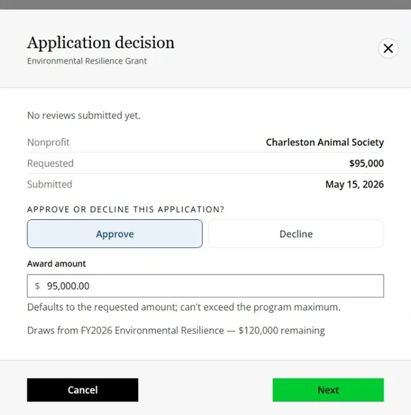 Application decision modal approving a grant award drawn from a fiscal-year budget